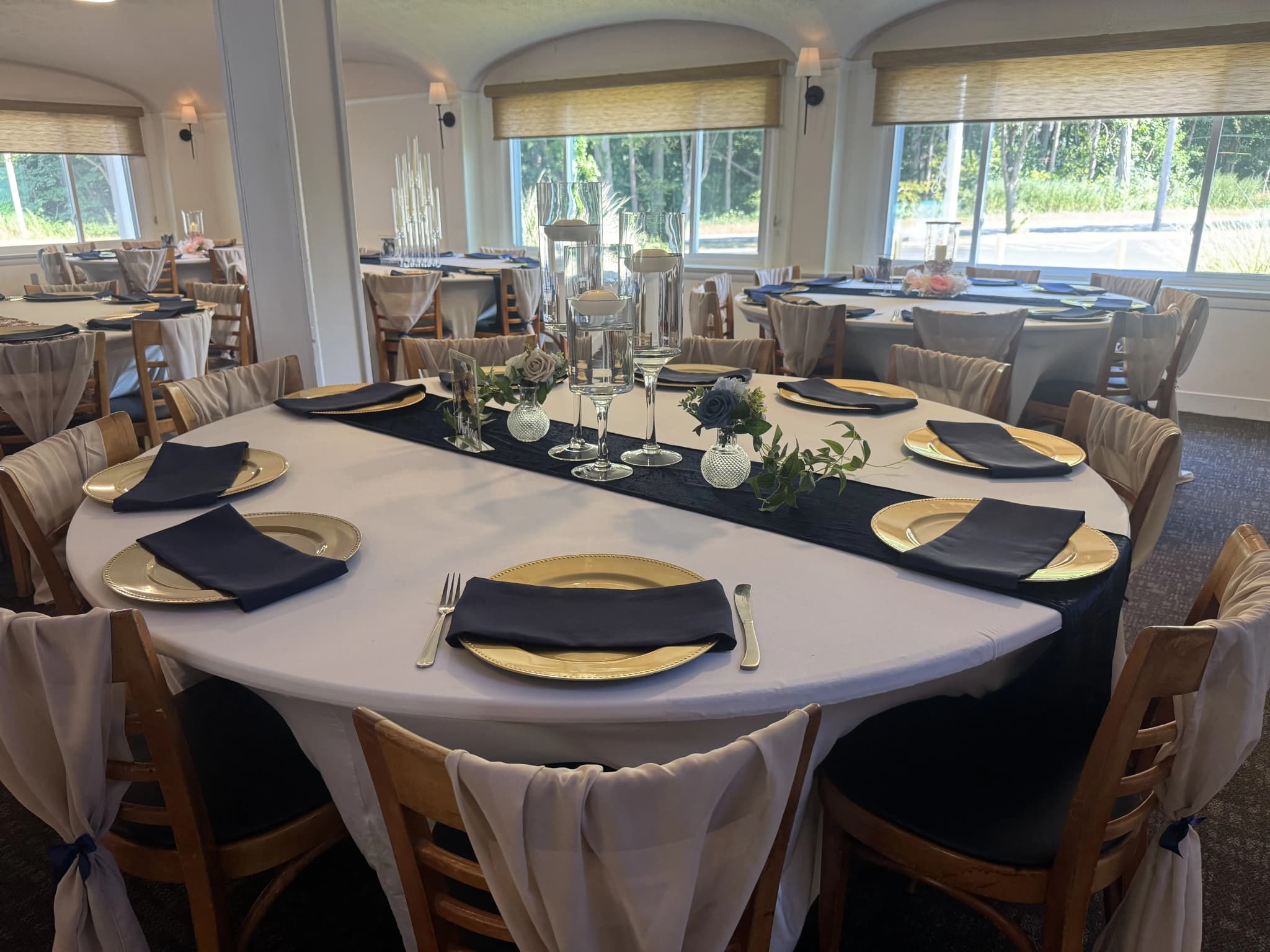 An elegant wedding centerpiece and table setting